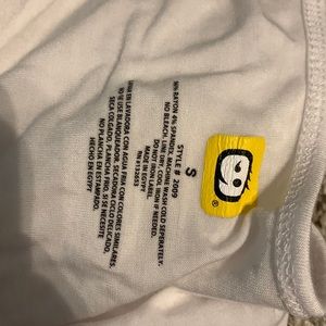 White under scrub top.